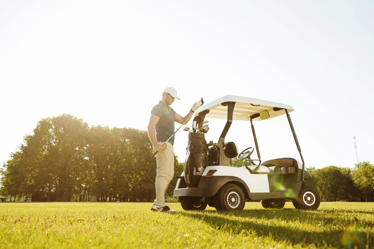 a man enjoying golf cart with increased life span